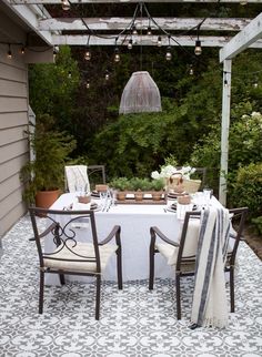 A step by step tutorial sharing how we stenciled our patio giving it a makeover on a budget.
