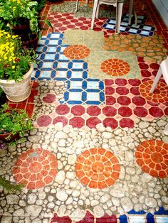 I hand painted my small concrete patio. This added so much color and happiness to my little piece of land at my Condo.