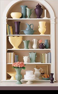 Pottery display on bookshelves-  Haeger Potteries was not one of my favorites but this display is to die for. You can still find these at affordable prices.
